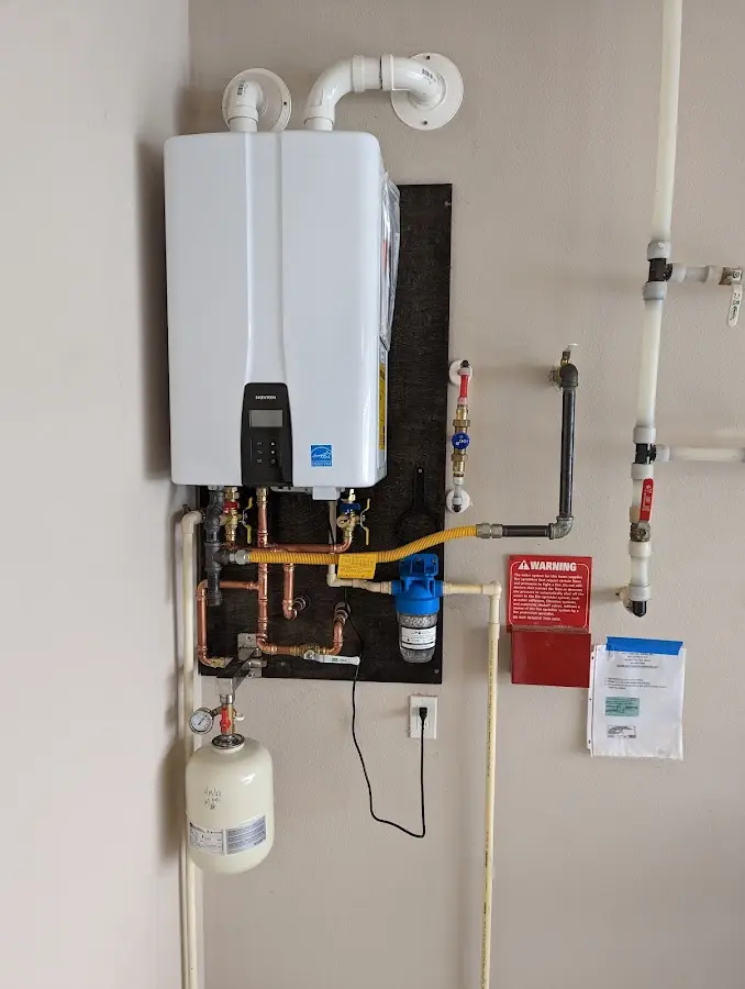 Professional plumber installing copper piping in a Castro Valley home